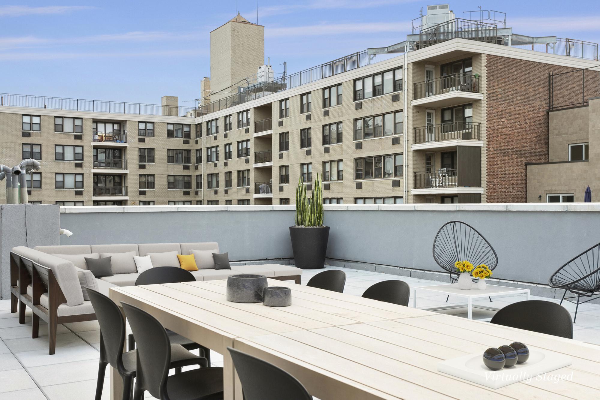 Roof Deck with Couch, Seating and Table and Community Table with Chairs
